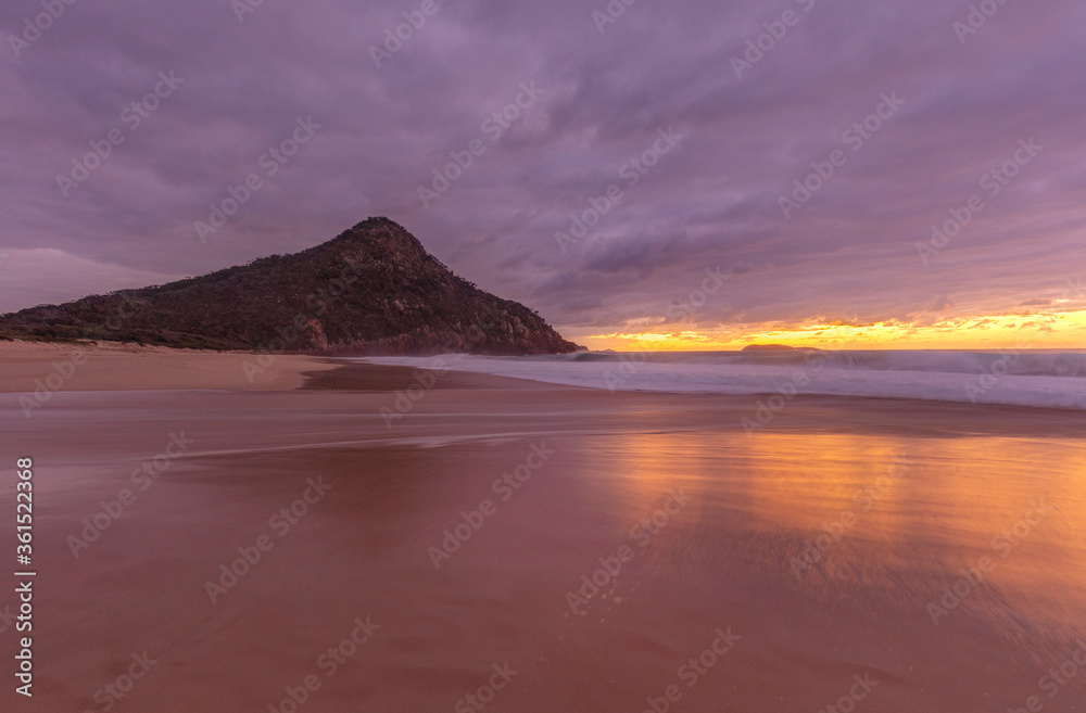 Beautiful ,sunrise over Tomaree Headland.Zenith Beach,Shoal Bay,Port Stephens.Hunter Region of N.S.W. East Coast of Australia.