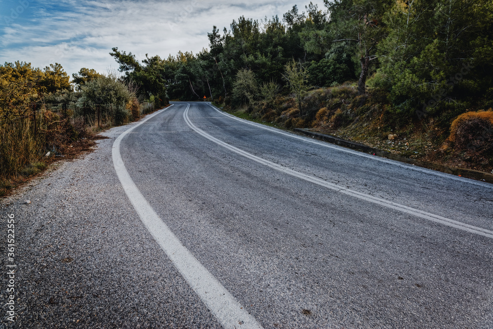 Cinematic road landscape. Lesbos Island, Greece. Misty road