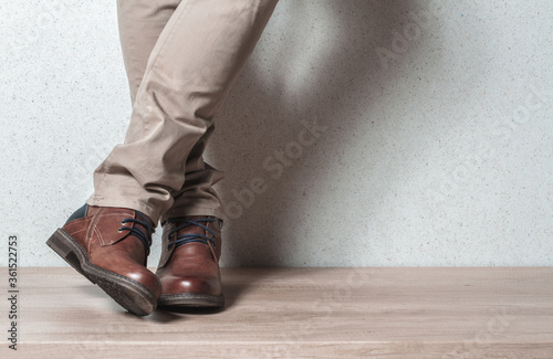 Men's shoes on a wooden floor