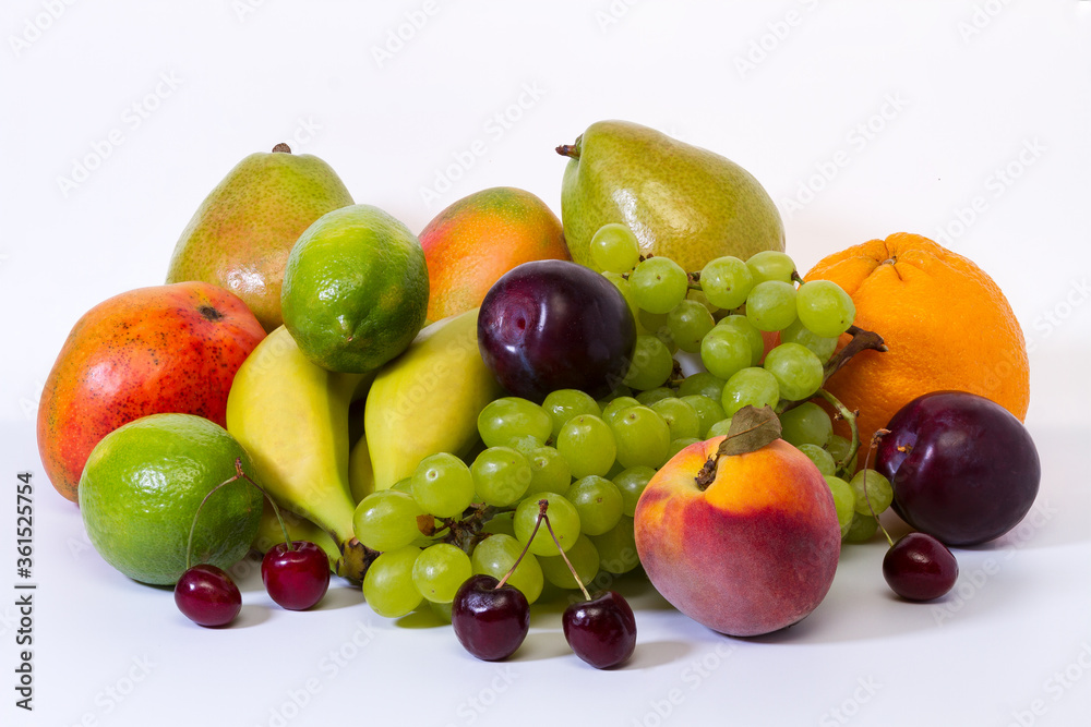 Assortment of exotic fruits on a white background. The concept of a healthy lifestyle. Assortment of exotic fruits on a white background. The concept of a healthy lifestyle.