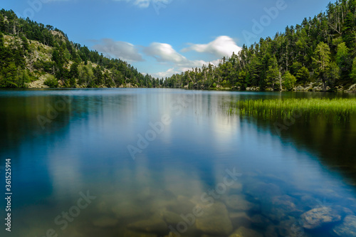 Reflections on the lake (Cacpir, France, Estany Llong) photo