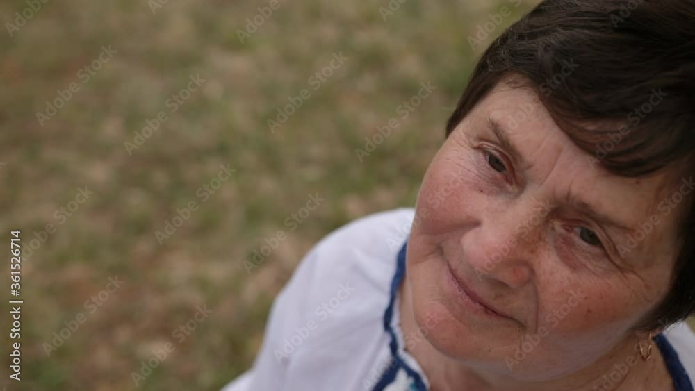 Upset stressed old mature woman, sad depressed aged senior lady grandma, sorrow grief poverty concept, disabled grandmother outside, in sadness. Portret pensive female with gloomy expression Upset stressed old mature woman, sad depressed aged senior lady grandma, sorrow grief poverty concept, disabled grandmother outside, in sadness. Portret pensive female with gloomy expression