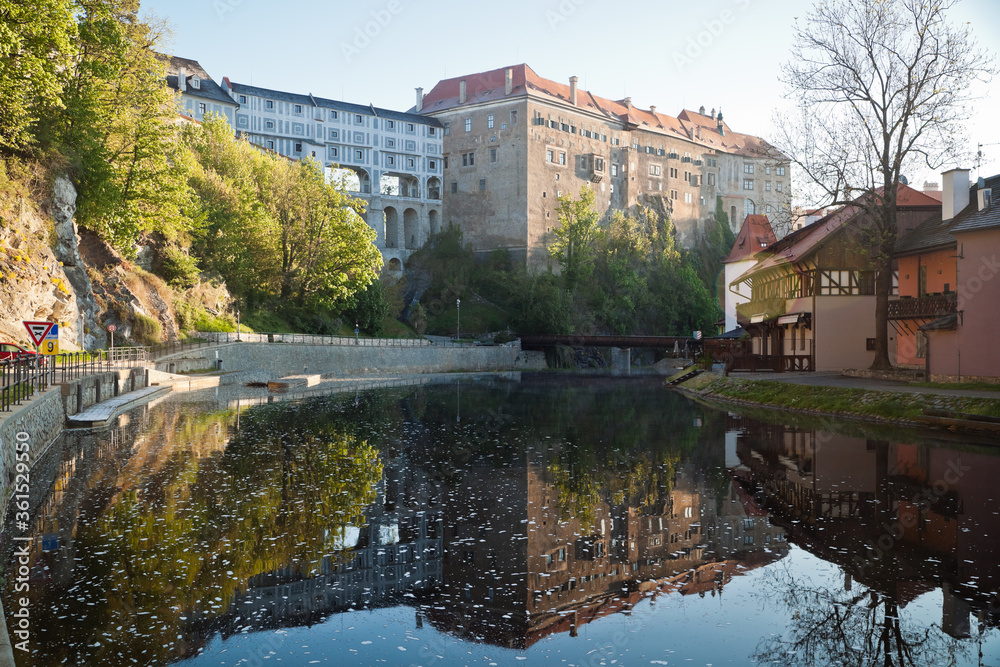 Riverbank of Vltava early morning in Cesky Krumlov and the state castle during lockdown