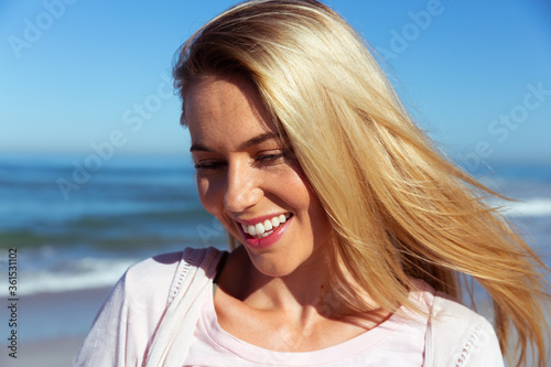Beautiful woman smiling on the beach