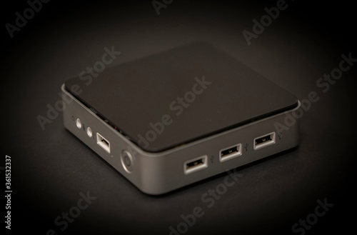 Fototapeta a mini PC with black background