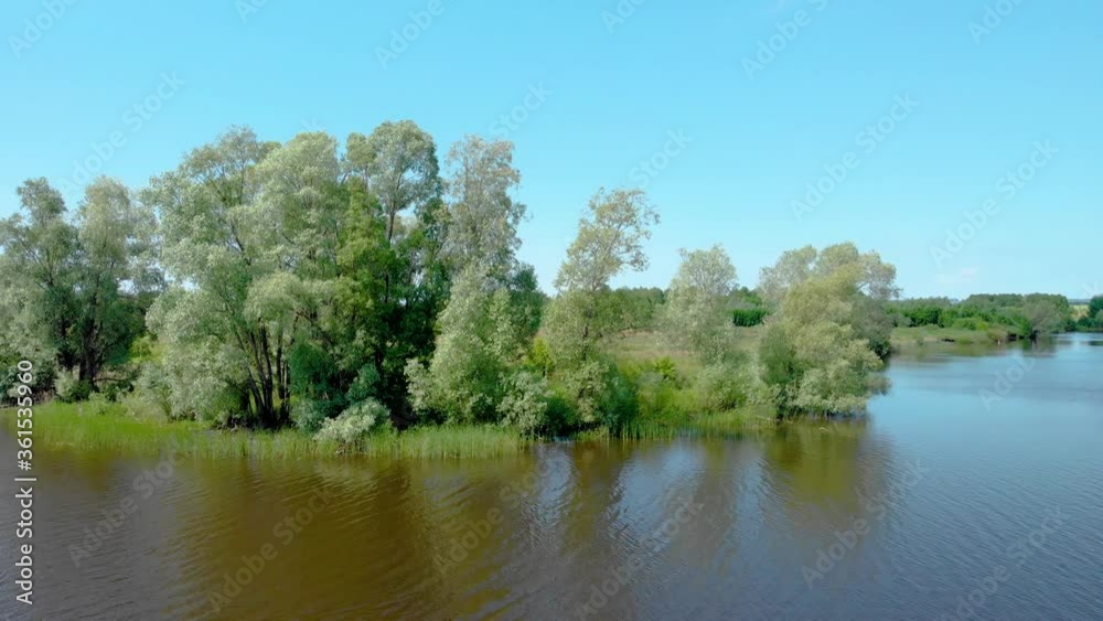 Sail on a bright day among green trees Sail on a bright day among green trees