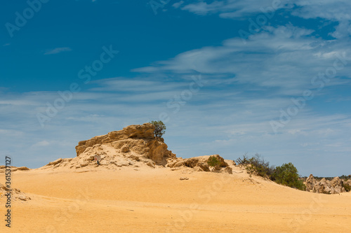 The Pinnacles in the Nambung National Park, Western Australia near the city of Cervantes are remains of ancient limestone formations or formed through the preservation of tree casts © photodigitaal.nl