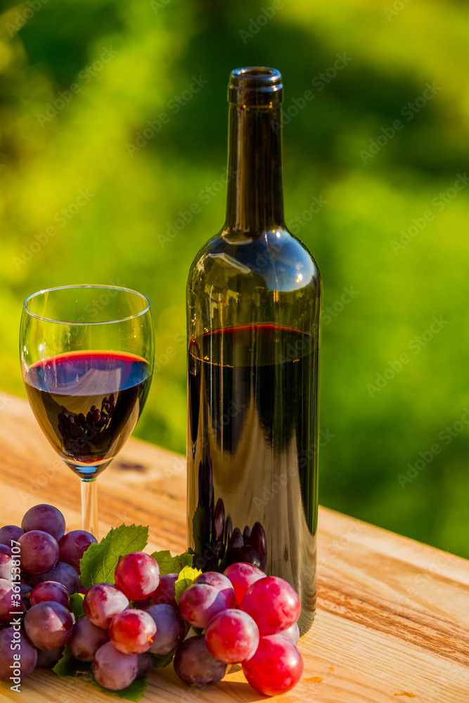 wine bottle and grapes