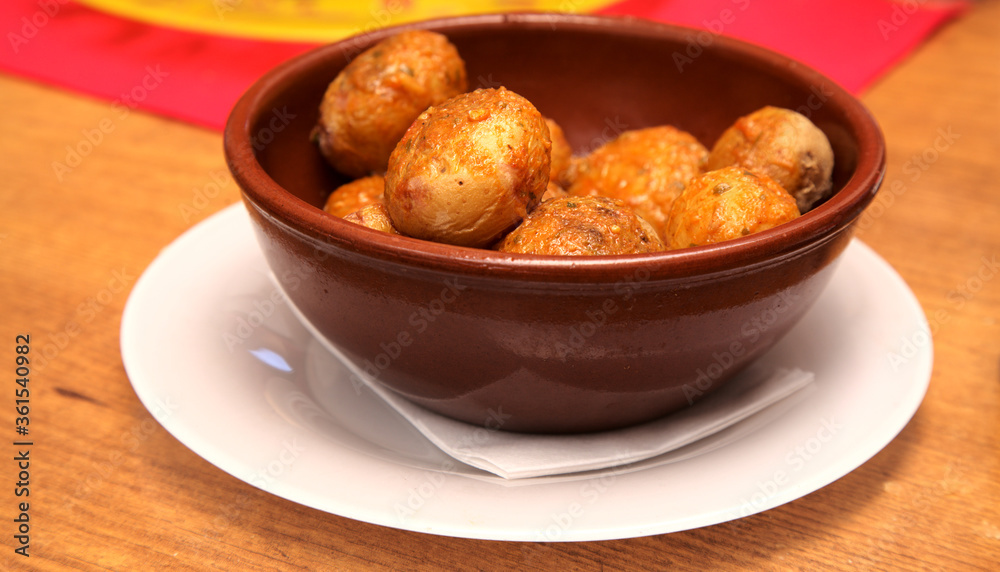Classic Canary Islands tapa - papas arrugadas, wrinkly potatoes, with red mojo sauce
Classic Canary Islands tapa - papas arrugadas, wrinkly potatoes, with red mojo sauce