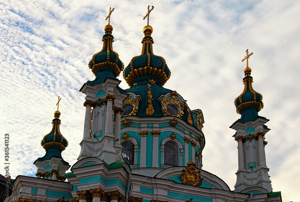 Detailed view of Baroque style Saint Andrew?s Church against colorful vibrant sky with fantastic soft clouds. It is one of the main attractions of the city. Famous romantic travel destination