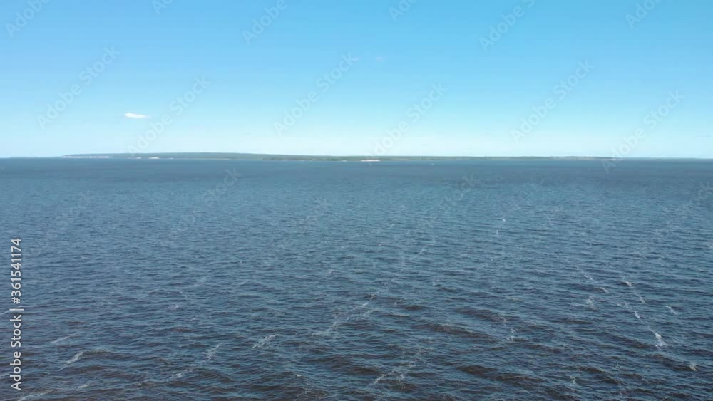 Panorama of a wide river on a bright day Panorama of a wide river on a bright day