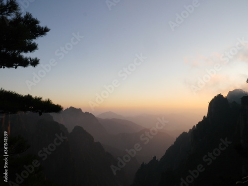 Mystic sunset in Huangshan mountains in China