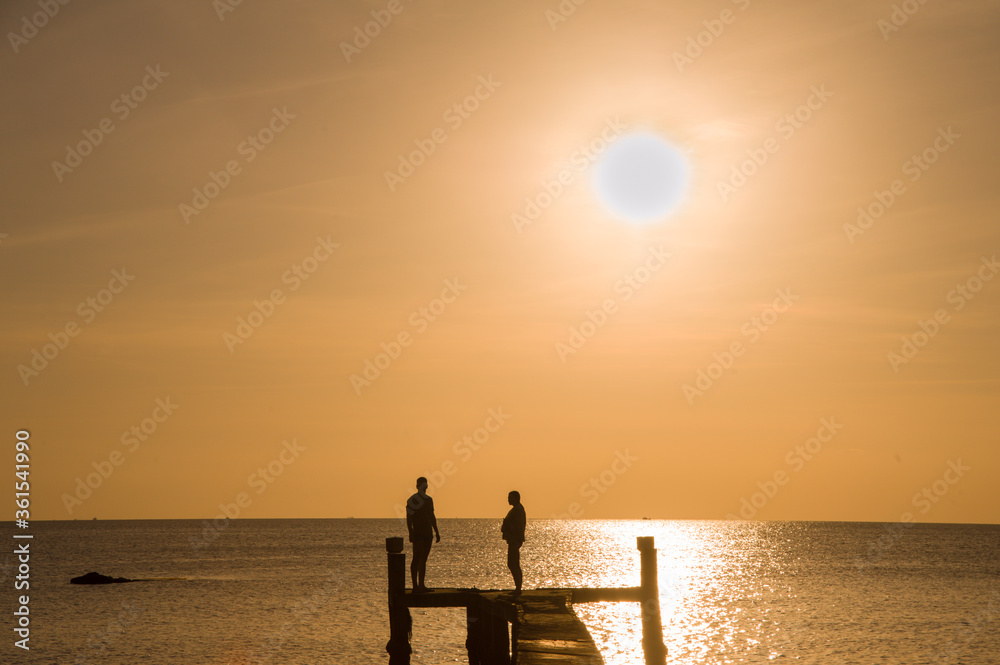 Silhouette of a couple on a beach