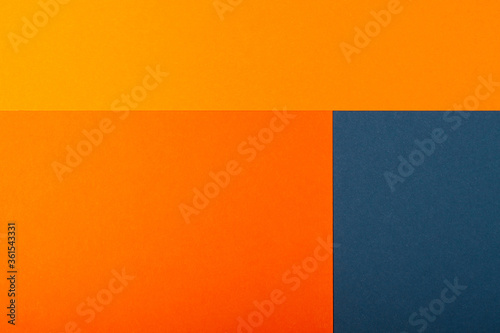 Abstract geometric paper background. Trendy blue and orange colors, active lines.