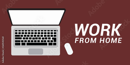 WORKSPACE LAPTOP WITH WORK FROM HOME TEXT. TOP VIEW. FLAT LAY