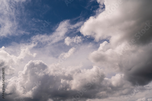 blue background sky and atmospheric white clouds © Сергей Черкашин