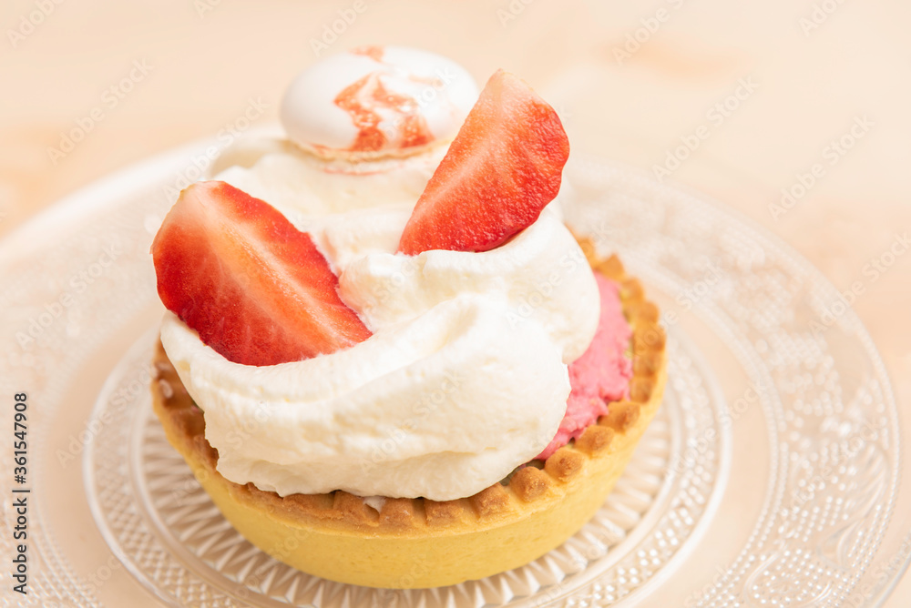 Homemade tarts with custard cream, white meringue and strawberry Homemade tarts with custard cream, white meringue and strawberry