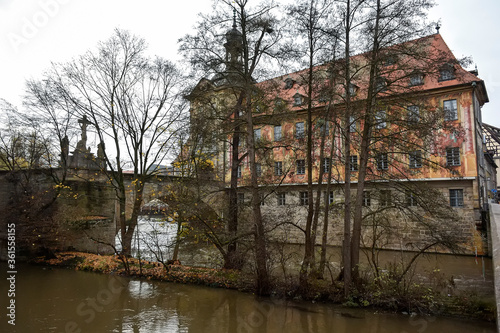 View of the Regnitz River and Old town hall or Altes Rathaus with two bridges in Bamberg, Bavaria, Franconia, Germany. 