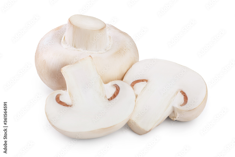 Fresh mushrooms champignon and half isolated on white background with clipping path Fresh mushrooms champignon and half isolated on white background with clipping path
