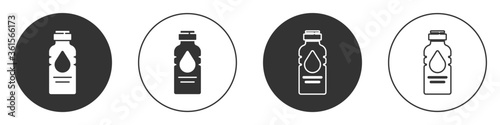 Black Bottle of water icon isolated on white background. Soda aqua drink sign. Circle button. Vector Illustration.