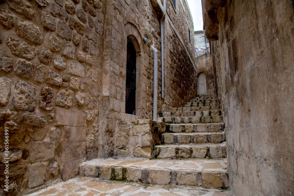 View of the narrow streets of the historic Mardin. Mardin, Turkey. View of the narrow streets of the historic Mardin. Mardin, Turkey.