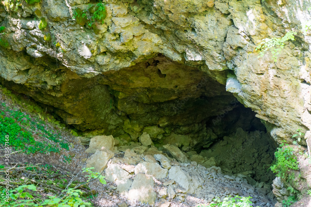 entrance to a cave in the Ichalkovsky forest
