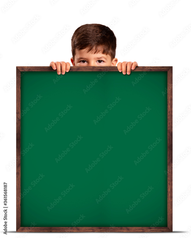 Child looking over green chalkboard on white background. concept school. Child looking over green chalkboard on white background. concept school.