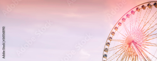 Photos Ferris Wheel Over Cloudy Sky During Sunset