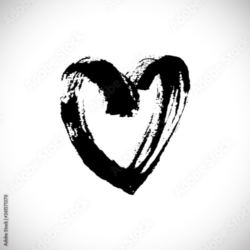 Нand drawn black heart silhouette with grunge brush and pencil (chalk or charcoal) texture. Vector illustration made by tracing. White background.