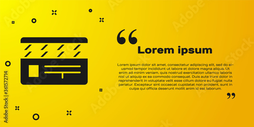 Black Movie clapper icon isolated on yellow background. Film clapper board. Clapperboard sign. Cinema production or media industry. Vector Illustration.