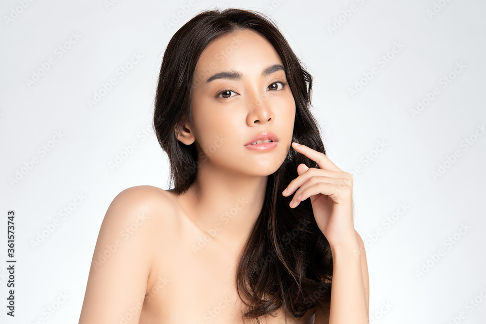 Beautiful Young asian Woman touching her clean face with fresh Healthy Skin, isolated on white background, Beauty Cosmetics and Facial treatment Concept Beautiful Young asian Woman touching her clean face with fresh Healthy Skin, isolated on white background, Beauty Cosmetics and Facial treatment Concept