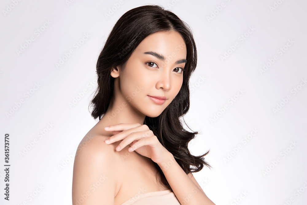 Beautiful Young Asian Woman touching her body with fresh Healthy Skin, isolated on white background, Beauty Cosmetics and Facial treatment Concept. Beautiful Young Asian Woman touching her body with fresh Healthy Skin, isolated on white background, Beauty Cosmetics and Facial treatment Concept.