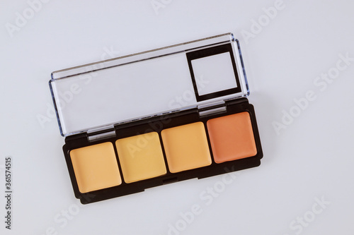 Fotografia, Obraz Set of eyeshadows in pastel beige colors pallet brown matte shadows, closeup of