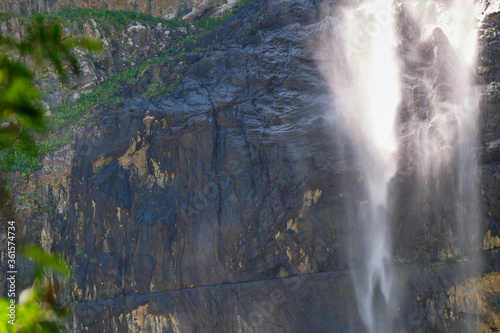 high in the mountains waterfall on the rocks