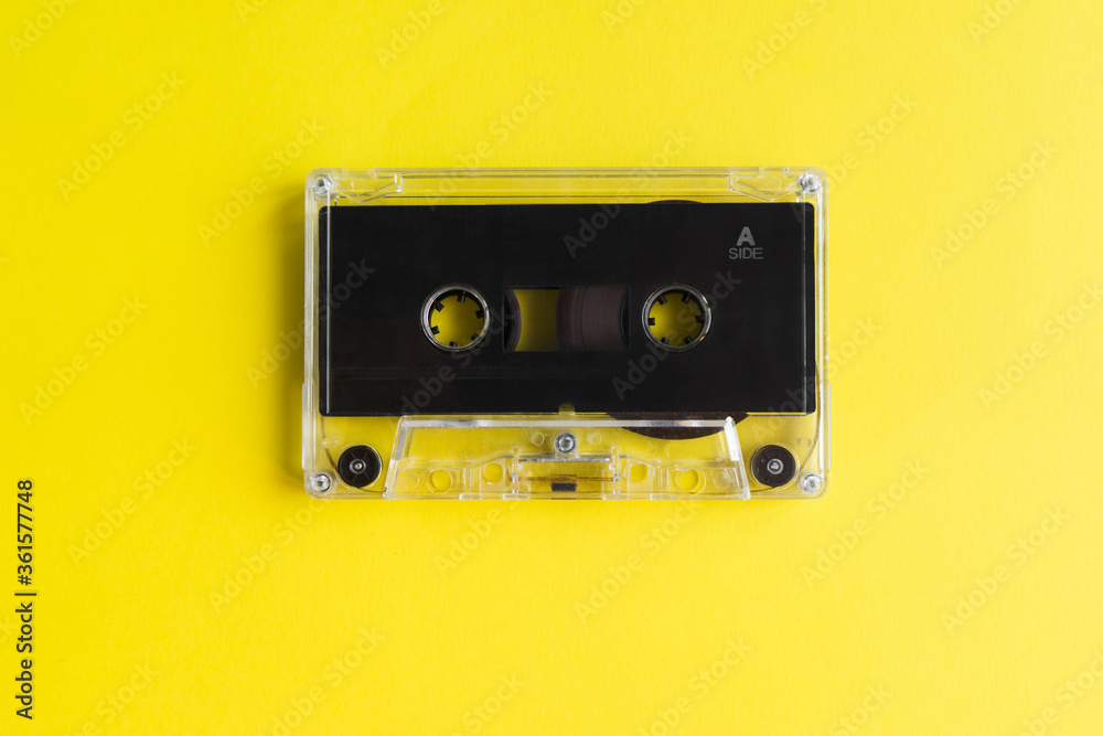 audio cassette tape on a yellow background audio cassette tape on a yellow background