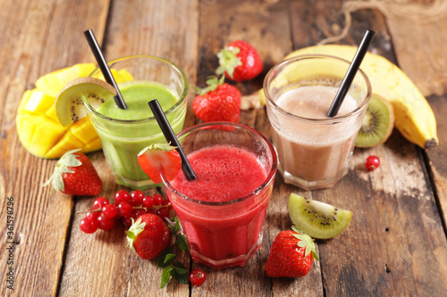 fruit juice- smoothie in glass with fresh fruits