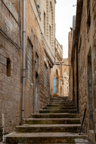 View of the narrow streets of the historic Mardin. Mardin, Turkey.