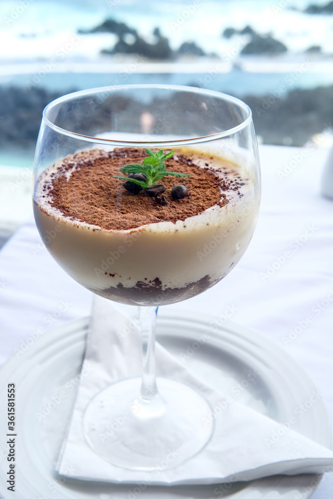 Tiramisu is a popular coffee-flavoured Italian dessert. It is made of ladyfingers dipped in coffee, layered with a whipped mixture of eggs, sugar, and mascarpone cheese, flavoured with cocoa Tiramisu is a popular coffee-flavoured Italian dessert. It is made of ladyfingers dipped in coffee, layered with a whipped mixture of eggs, sugar, and mascarpone cheese, flavoured with cocoa