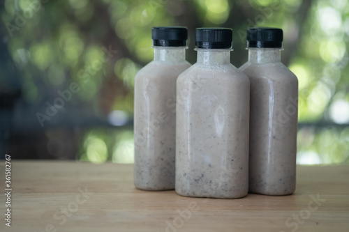 Mix of various nuts smoothie in plastic bottle