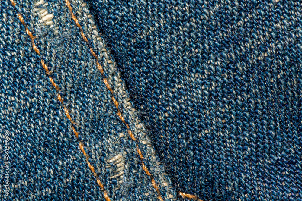 Blue denim jeans with stitches texture background. Blue denim jeans with stitches texture background.