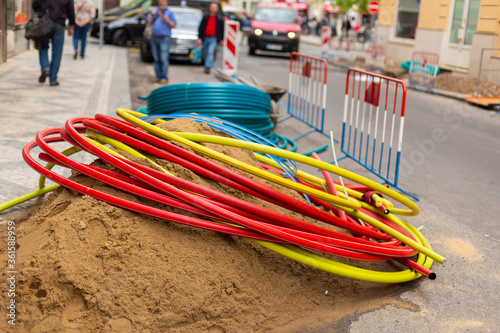 Wallpaper Mural Repair work on city streets. Laying cable routes. Coils of plastic casings Torontodigital.ca