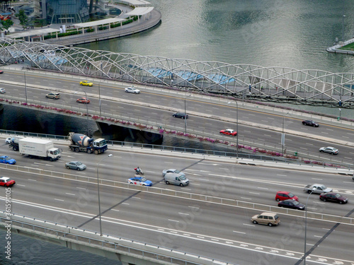 aerial view of highway road traffic on bridge and vehicle passing