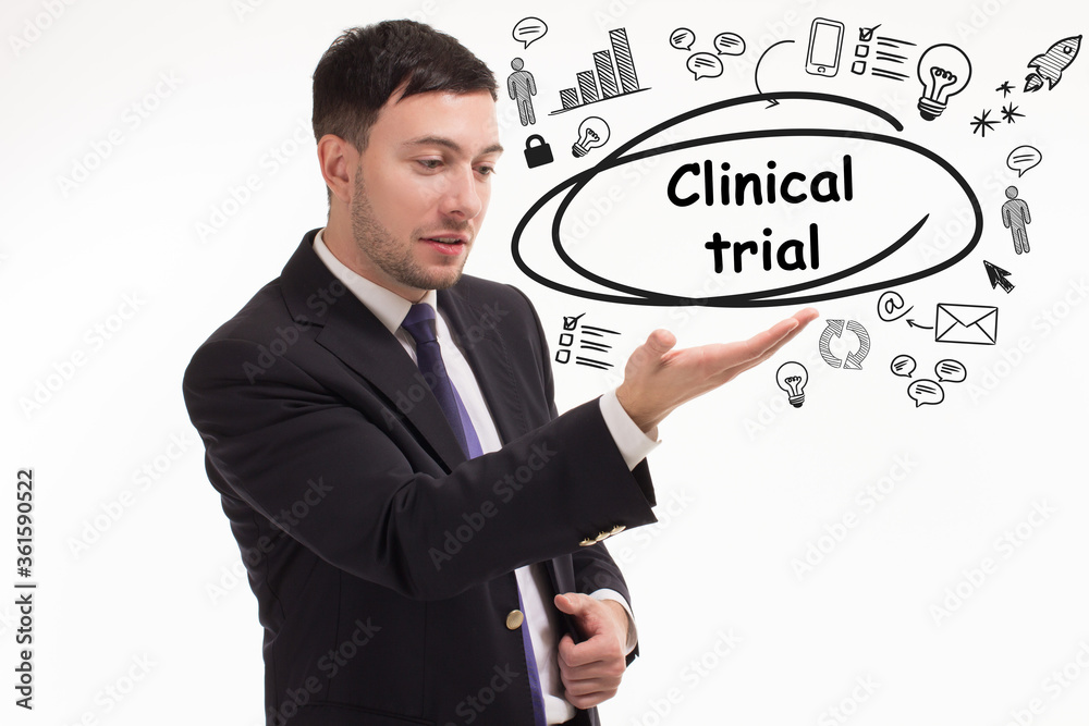 Business, technology, internet and network concept. Young businessman thinks over the steps for successful growth: Clinical trial Business, technology, internet and network concept. Young businessman thinks over the steps for successful growth: Clinical trial