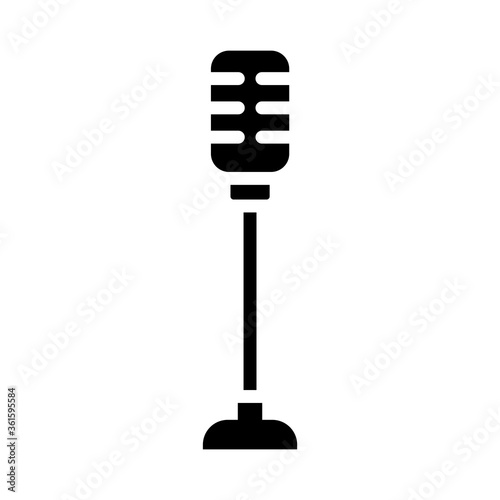 retro microphone on stand icon, silhouette style