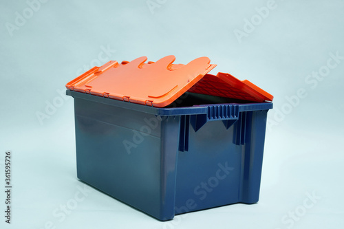 Plastic storage boxes. Boxes for the delivery of products. Orderly storage.