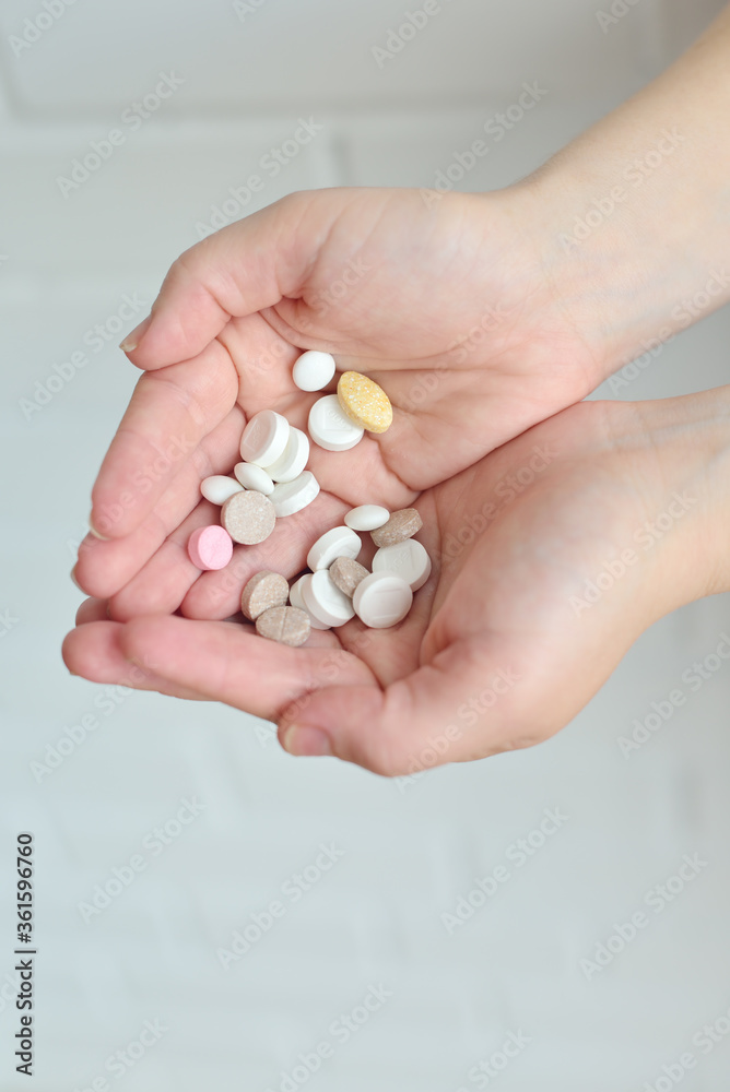 Many pills in the palms Many pills in the palms