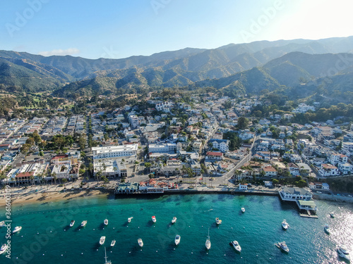 Aerial view of Avalon downtown and bay with boats in Santa Catalina Island, famous tourist attraction in Southern California, USA © Unwind