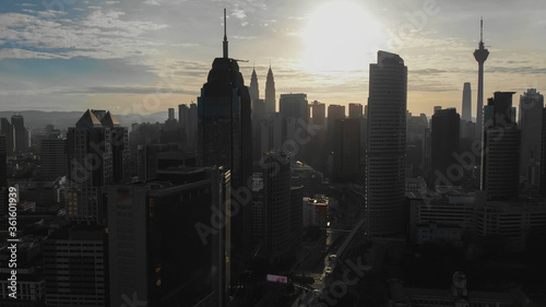 Canvas Print Aerial view of the silhouette of skyscrapers and the city center of Kuala Lumpur
