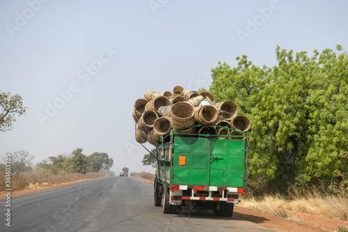 Photos A truck fully loaded with sorrel baskets on a road in northern Benin