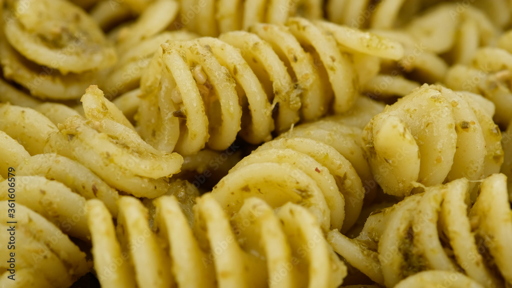 pasta with pesto alla genovese, top view pasta with pesto alla genovese, top view